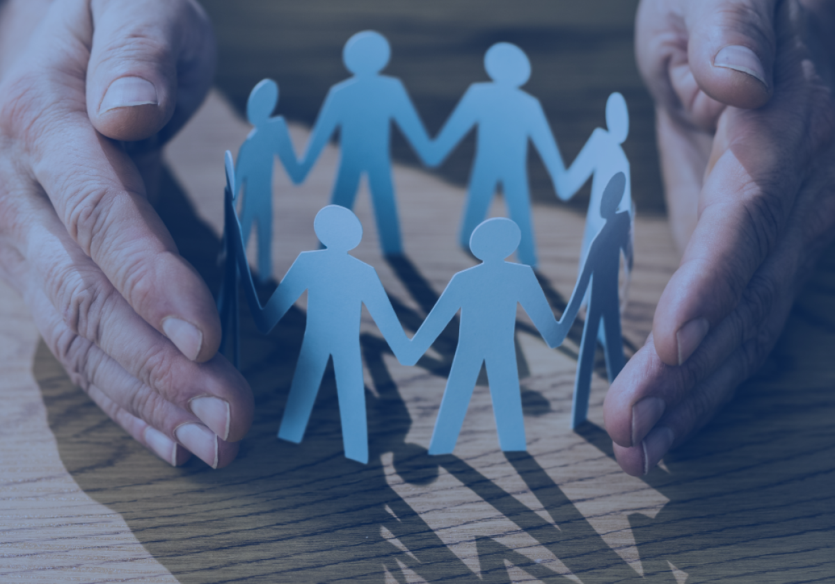 Employees cut out holding hands